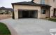 Curved driveway with stamped and colored border in Boise